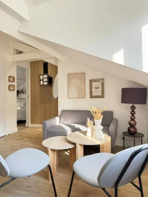Coin salon dans l'établissement Appartement charmant et cosy Encombe vineuse-DABNB