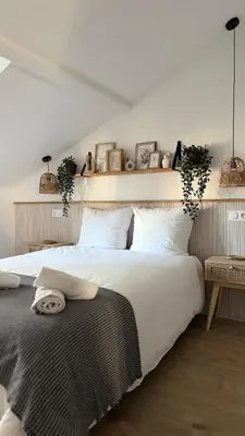 Un ou plusieurs lits dans un hébergement de l'établissement Appartement charmant et cosy Encombe vineuse-DABNB