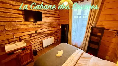 Un ou plusieurs lits dans un hébergement de l'établissement La maison du Trappeur et la cabane des sources