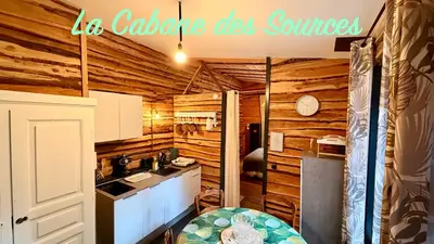 Cuisine ou kitchenette dans l'établissement La maison du Trappeur et la cabane des sources