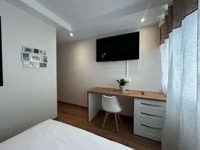 Télévision ou salle de divertissement dans l'établissement La Suite Auzette, calme et chic