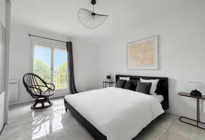 Un ou plusieurs lits dans un hébergement de l'établissement Le Priou - Maison Avec Grand Jardin