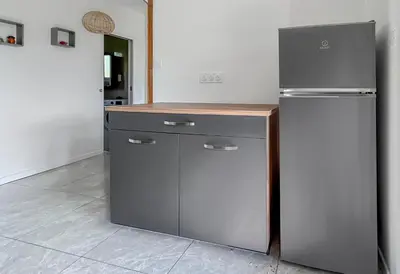 Cuisine ou kitchenette dans l'établissement Le Priou - Maison Avec Grand Jardin