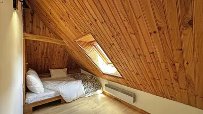 Un ou plusieurs lits dans un hébergement de l'établissement La petite maison