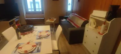 Coin salon dans l'établissement Appartement Au Cœur du Village