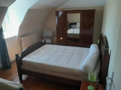 Un ou plusieurs lits dans un hébergement de l'établissement Maison de campagne