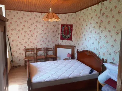 Un ou plusieurs lits dans un hébergement de l'établissement Maison de campagne