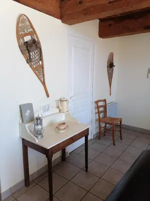 Coin salon dans l'établissement Les Gîtes du Clos