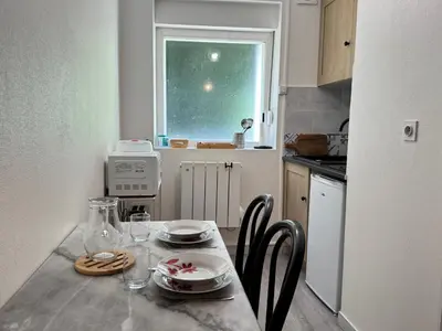 Cuisine ou kitchenette dans l'établissement Le Cocon
