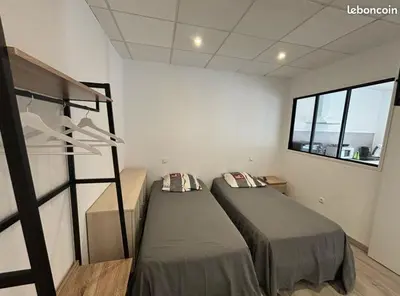 Un ou plusieurs lits dans un hébergement de l'établissement Cantal BNB