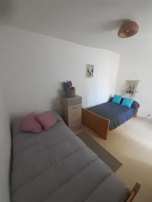 Un ou plusieurs lits dans un hébergement de l'établissement Villa périgourdine avec piscine