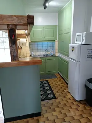 Cuisine ou kitchenette dans l'établissement Villa périgourdine avec piscine