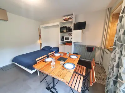 Cuisine ou kitchenette dans l'établissement La Pause Bourboulienne Appartement RDC avec balcon