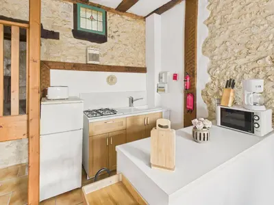 Cuisine ou kitchenette dans l'établissement Gite mitoyen - 4 personnes - piscine commune