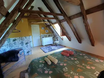 Un ou plusieurs lits dans un hébergement de l'établissement Gîte de charme piscine privée à Martel