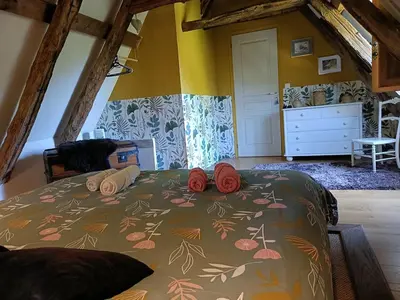 Un ou plusieurs lits dans un hébergement de l'établissement Gîte de charme piscine privée à Martel