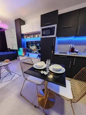 Cuisine ou kitchenette dans l'établissement - Aux Bulles 2 - Suite & SPA - By Skyline Résidence