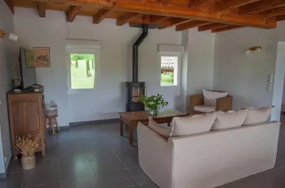 Coin salon dans l'établissement Gîte du Causse Loubressac