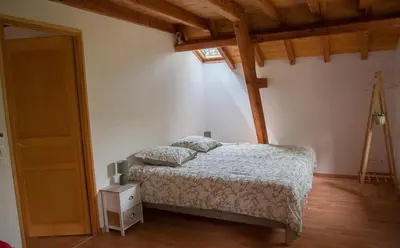 Un ou plusieurs lits dans un hébergement de l'établissement Gîte du Causse Loubressac