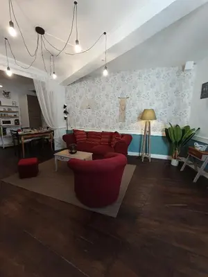 Coin salon dans l'établissement Le Liberté appartement privatif