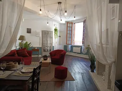 Coin salon dans l'établissement Le Liberté appartement privatif