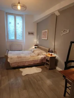 Un ou plusieurs lits dans un hébergement de l'établissement Le Liberté appartement privatif