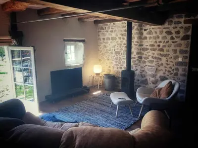 Coin salon dans l'établissement Vakantiehuis in groene oase