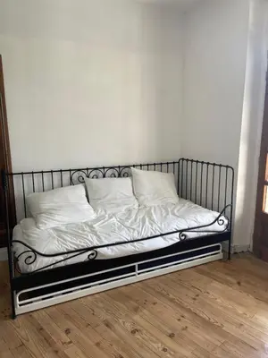 Un ou plusieurs lits dans un hébergement de l'établissement Maison au cœur de ville
