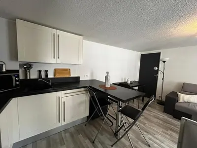 Cuisine ou kitchenette dans l'établissement Le Saint-Pierre, spacieux en hypercentre