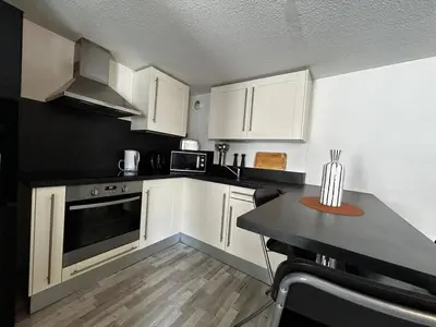 Cuisine ou kitchenette dans l'établissement Le Saint-Pierre, spacieux en hypercentre