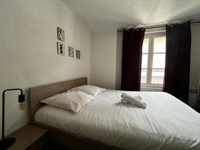 Un ou plusieurs lits dans un hébergement de l'établissement Le Saint-Pierre, spacieux en hypercentre