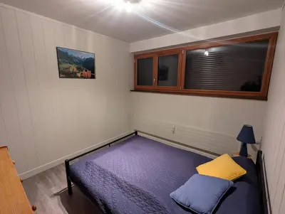 Un ou plusieurs lits dans un hébergement de l'établissement Appartement 5 personnes avec garage, balcon et belle vue