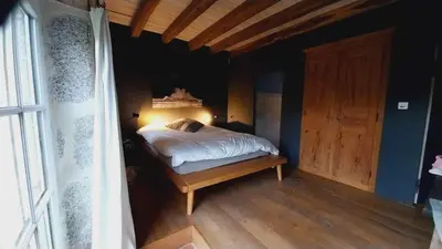 Un ou plusieurs lits dans un hébergement de l'établissement Vakantiehuis in groene oasis