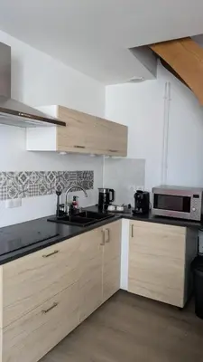 Cuisine ou kitchenette dans l'établissement Le Duplex de la mairie