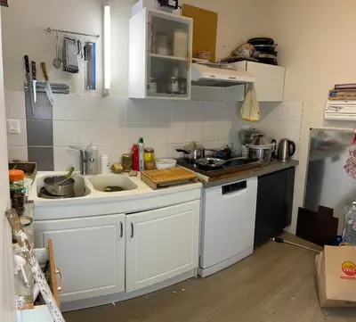 Cuisine ou kitchenette dans l'établissement Chambre lumineuse Au calme avec place de parking privé