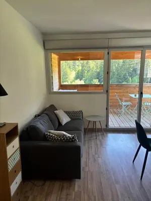 Coin salon dans l'établissement Le Paradis