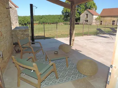 Terrasse ou espace extérieur de l'établissement Maison de charme avec Piscine en Périgord