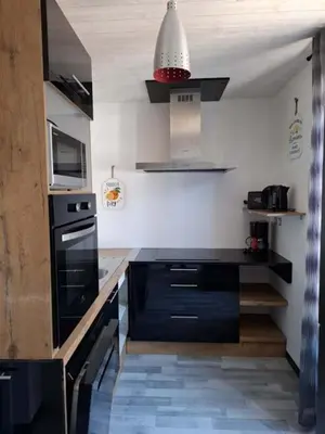 Cuisine ou kitchenette dans l'établissement le nid des choups esprit loft 50 m2
