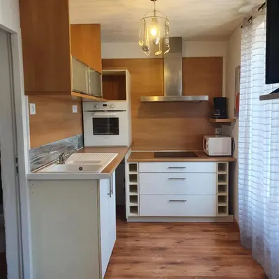 Cuisine ou kitchenette dans l'établissement le nid des choups esprit cocoon 2 chambres