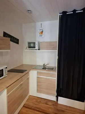 Cuisine ou kitchenette dans l'établissement le nid des choups le petit duplex 2 personnes
