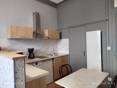 Cuisine ou kitchenette dans l'établissement Le Sarciron 152