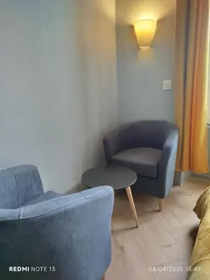 Coin salon dans l'établissement Le Sarciron 152