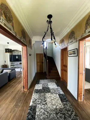 Télévision ou salle de divertissement dans l'établissement Maison de famille en Haute Corrèze