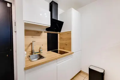 Cuisine ou kitchenette dans l'établissement Le confortable - Proche gare -