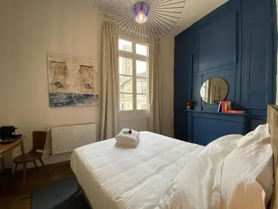Un ou plusieurs lits dans un hébergement de l'établissement Les Chambres du Cloître, la Beurrière