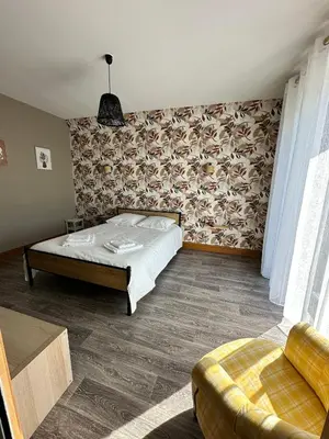 Un ou plusieurs lits dans un hébergement de l'établissement Villa Belle Pierre en Corrèze