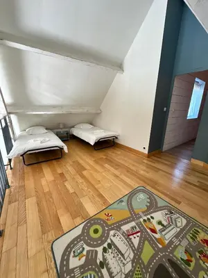 Un ou plusieurs lits dans un hébergement de l'établissement Villa Belle Pierre en Corrèze
