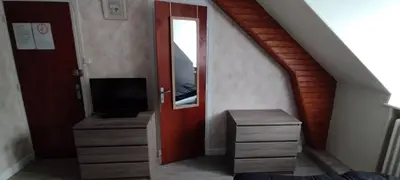 Télévision ou salle de divertissement dans l'établissement Villa Mon Repos 5