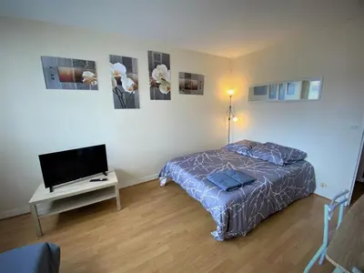 Un ou plusieurs lits dans un hébergement de l'établissement Appartement double à Limoges