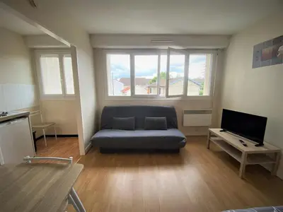 Télévision ou salle de divertissement dans l'établissement Appartement double à Limoges